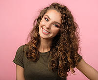 Young woman with fixed braces - Orthodontist in Munich, Dental practice Seehofer